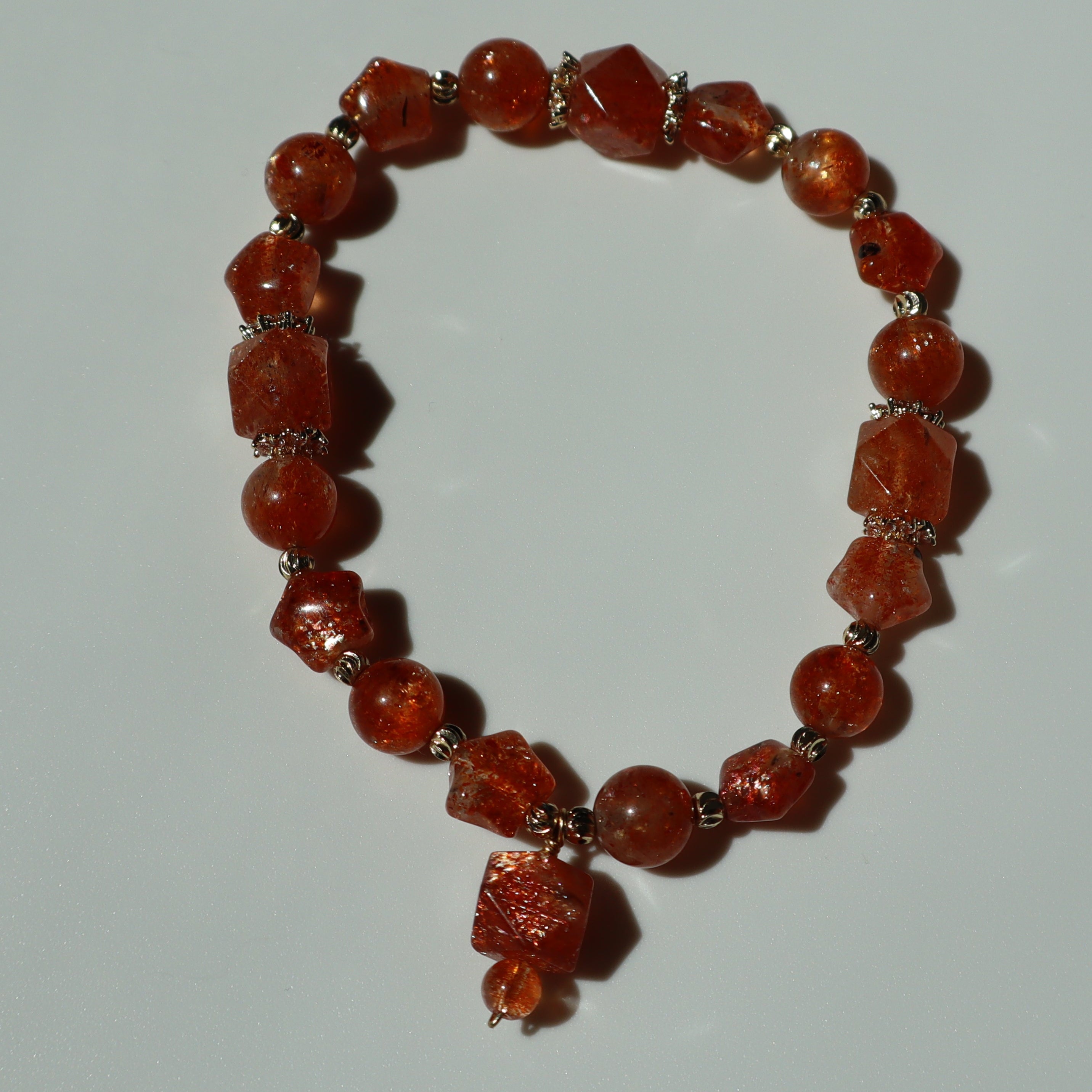 6mm Orange Star Shaped Sunstone Bracelet with Gold Zircon Findings