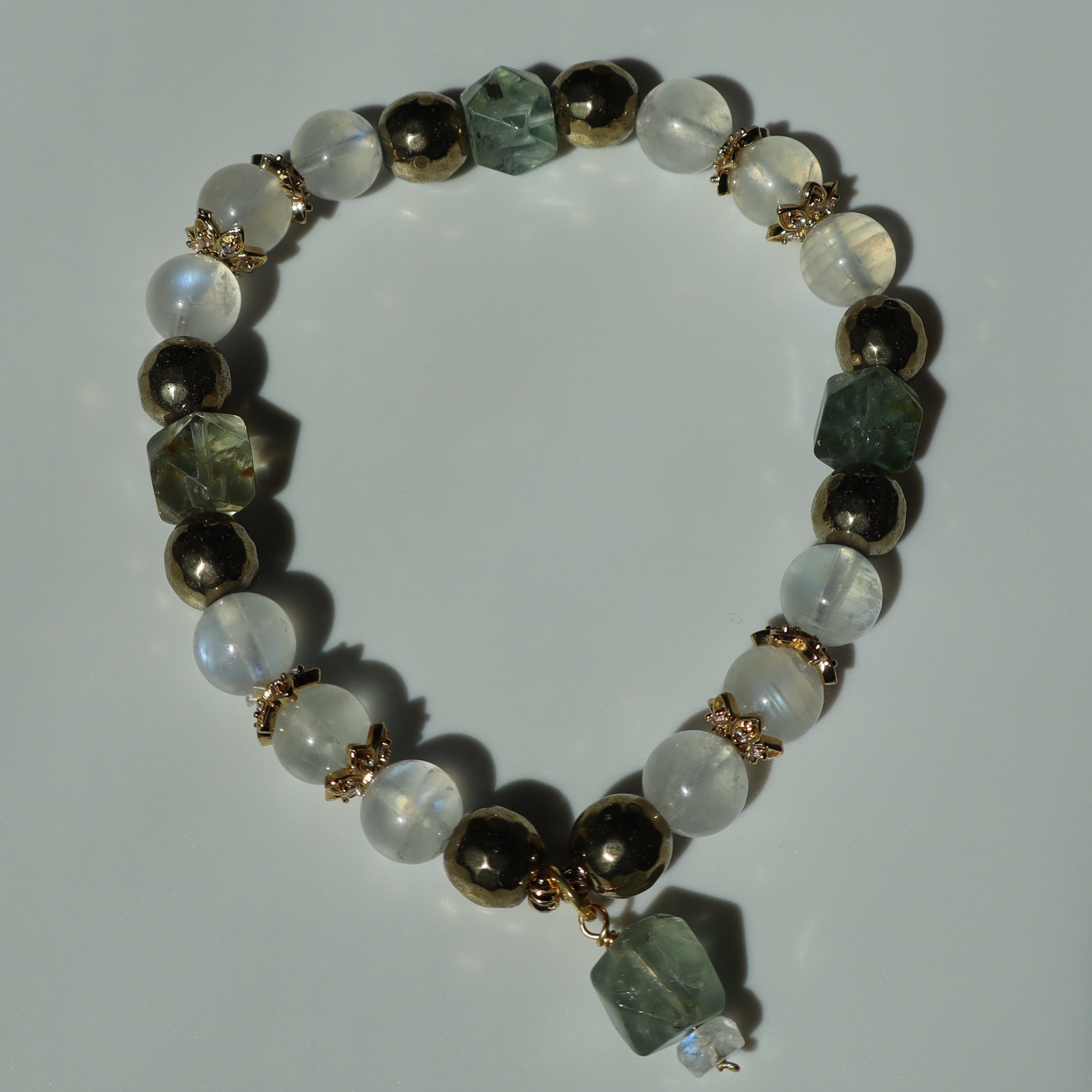 6mm Blue Moonstone Pyrite Arusha Bracelet with Gold Dangle and Zircon Findings